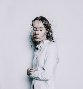 “a0dcf563-9393-4606-8302-c8f649e43895_rw_1200.jpg” by Flóra Borsi is licensed under CC BY-NC-ND 4.0 Image showing art depicting a person with a face that has shattered as if made of glass
