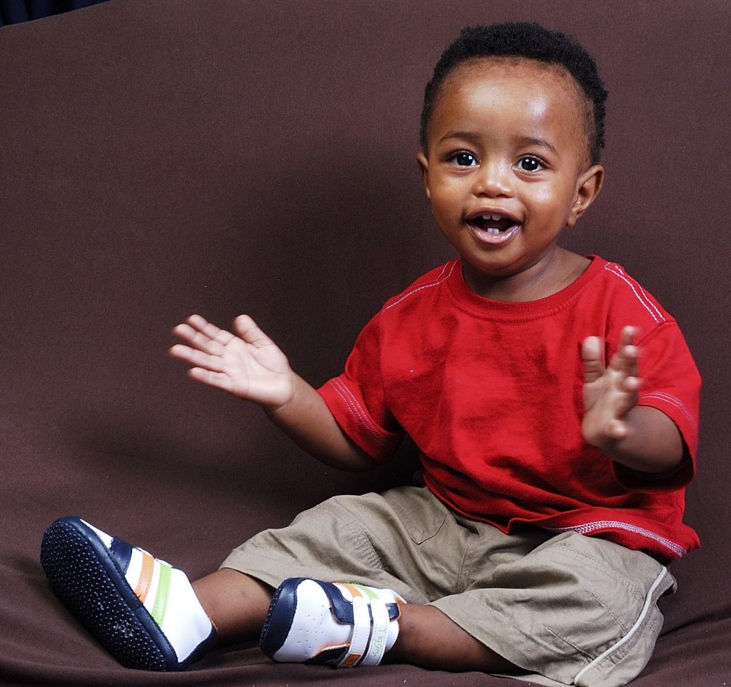 “Happy Toddler” by Chris Bloom is licensed under CC BY-SA 2.0 Photo showing happy toddler