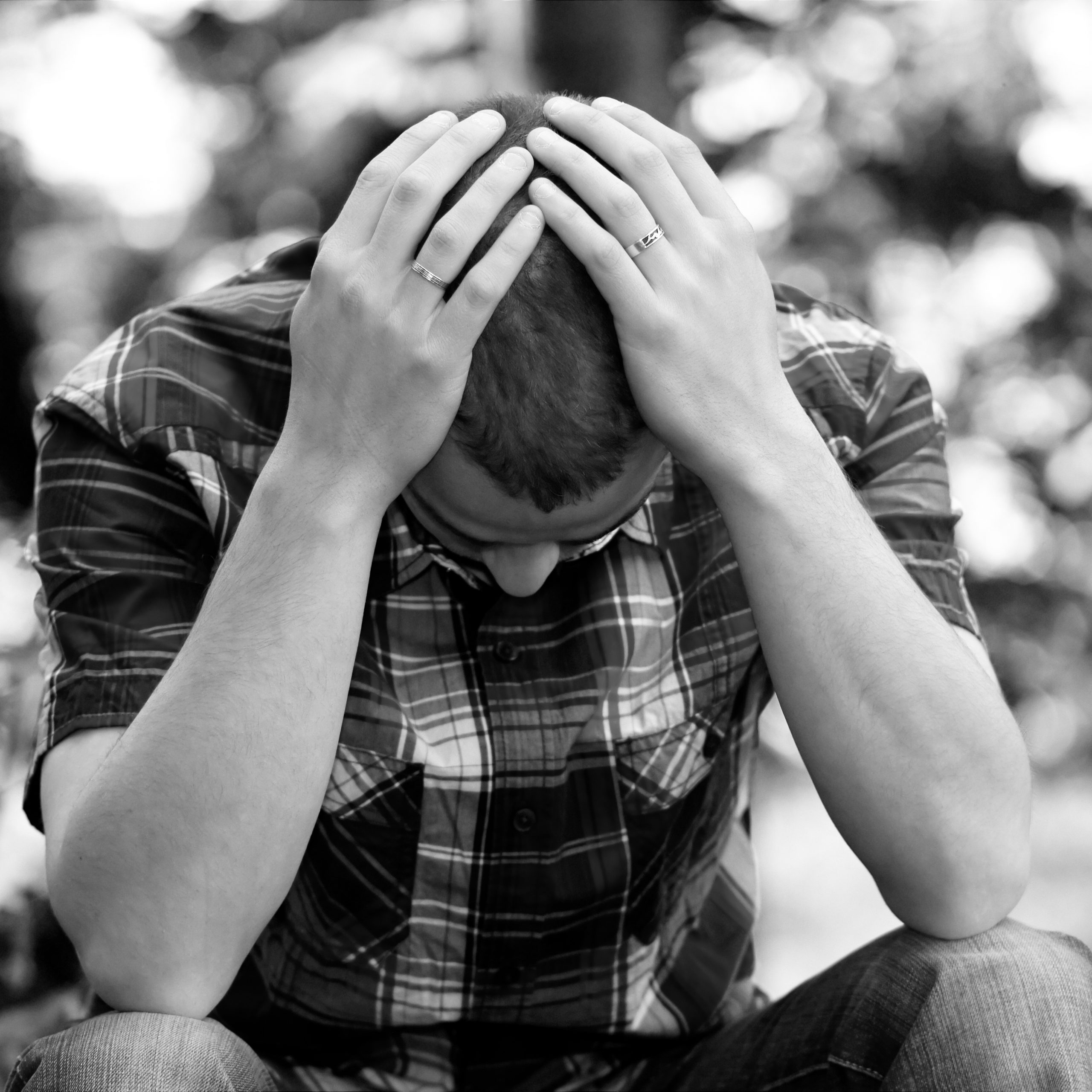 “Depressed_(4649749639).jpg” by Sander van der Wel is licensed under CC BY-SA 2.0 Image of person with head and hands to depict depression