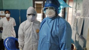 “Healthcare_workers_wearing_PPE_03.jpg” by Javed Anees is licensed under CC0 1.0 Photo showing medical staff wearing Personal Protective Equipment