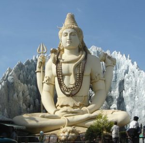 “Shiva_Bangalore.jpg” by Kalyan Kumar is licensed under CC BY-SA 2.0 Image showing a statue of Shiva in Yogic Meditation