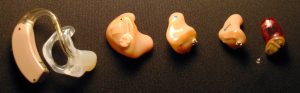 ”Traditional_hearing_aids.jpg” by ikesters is licensed under CC BY-SA 2.0
