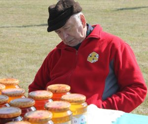 “fatigue_sleep_head_old_honey-454317.jpg” by danielam is licensed under CC0 Image of older man sleeping at an outdoor table setting