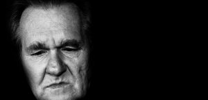 “man-416470_960_720.jpg” by geralt is licensed under CC0 Image showing face of elderly man looking depressed