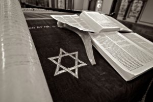 “star-of-david-458372_960_720.jpg” by hurk is licensed under CC0 Image showing The Torah and Star of David