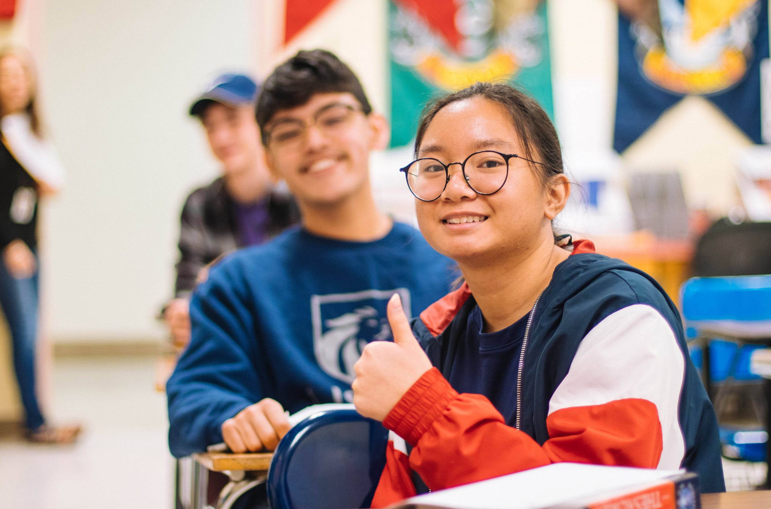 Students in class smiling