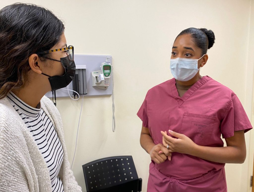 Nurse speaking to a patient