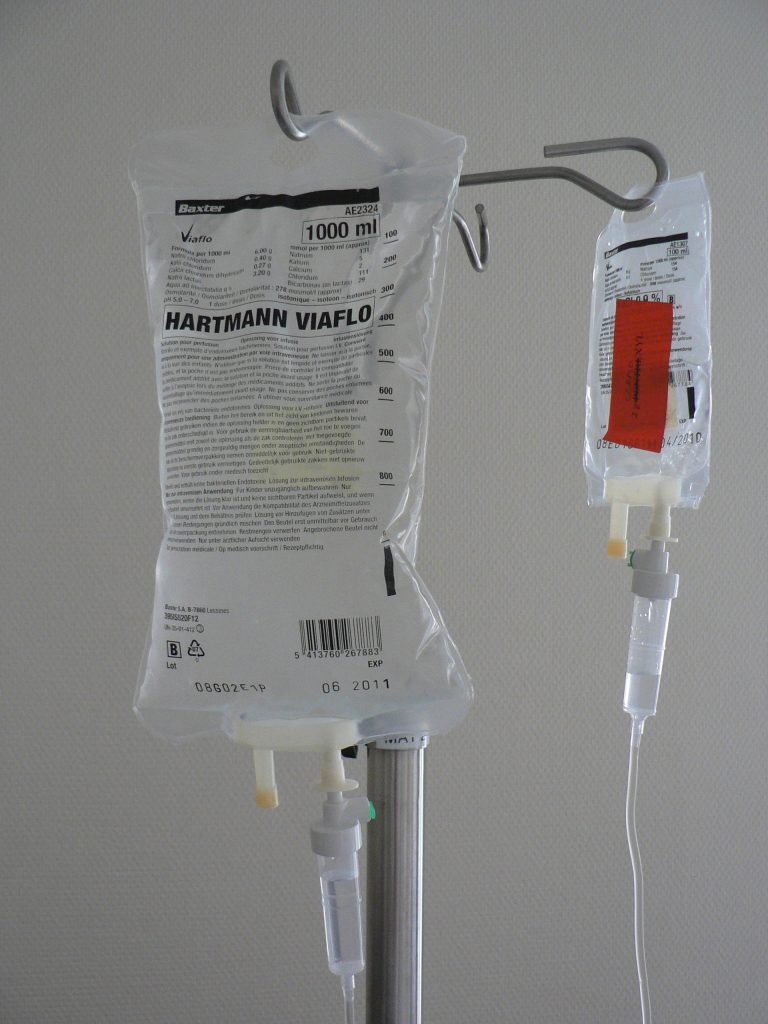 Infusion bag hanging and filled with clear fluid