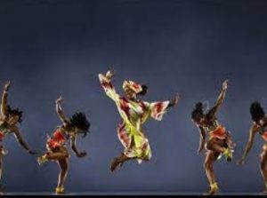 A color image of dancers on stage