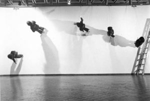 Trisha Brown in her performance "Walking on the Wall"