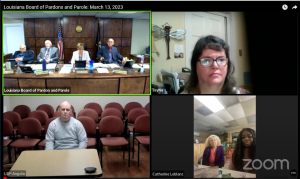 Four-part video conference with the Louisiana Board of Pardon and Parole, a woman wearing glasses, a man in a gray sweater, and an older woman in an office.