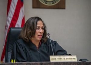 Black female judge speaking in her courtroom