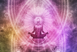 “meditation-1384758_960_720.jpg” by Activedia is licensed under CC0 Image showing meditating figure in a colorful, abstract environment