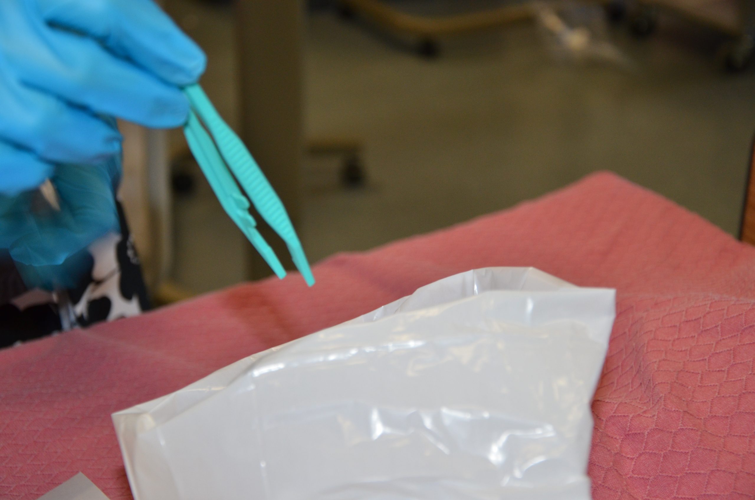 Discard transfer forceps as per agency policy