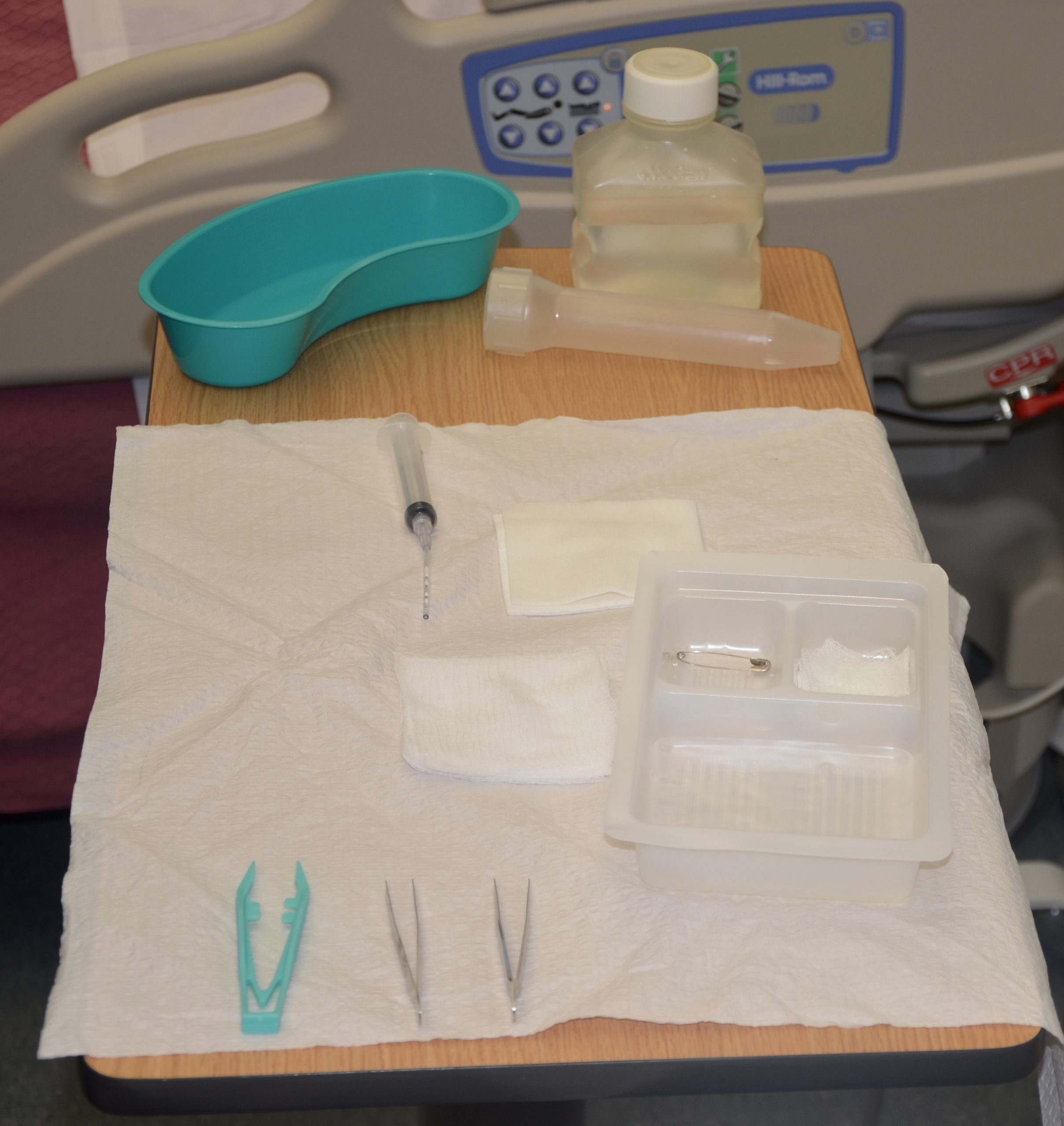 Gather supplies and set up sterile tray