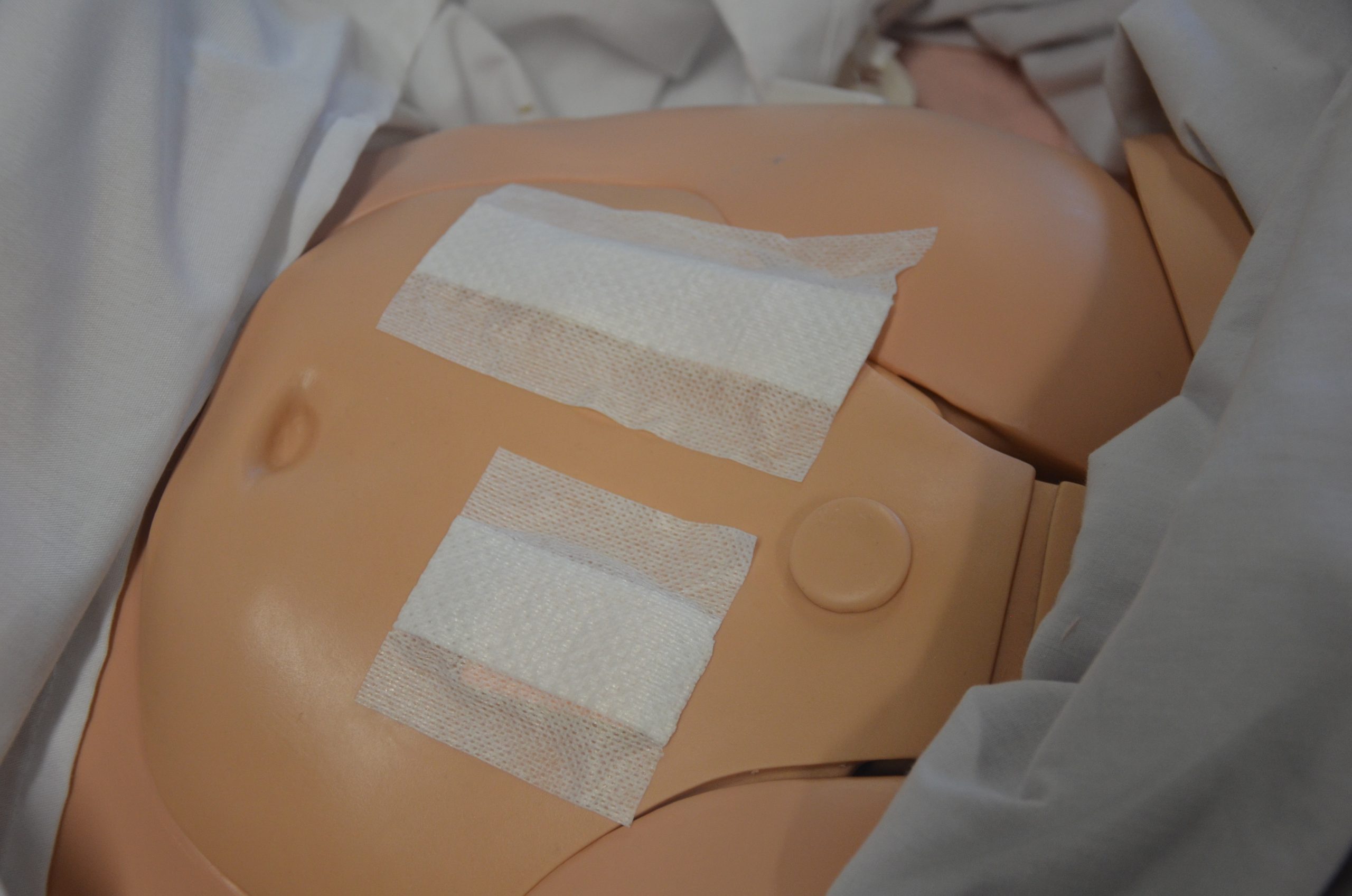 Cover drain site with sterile dressing