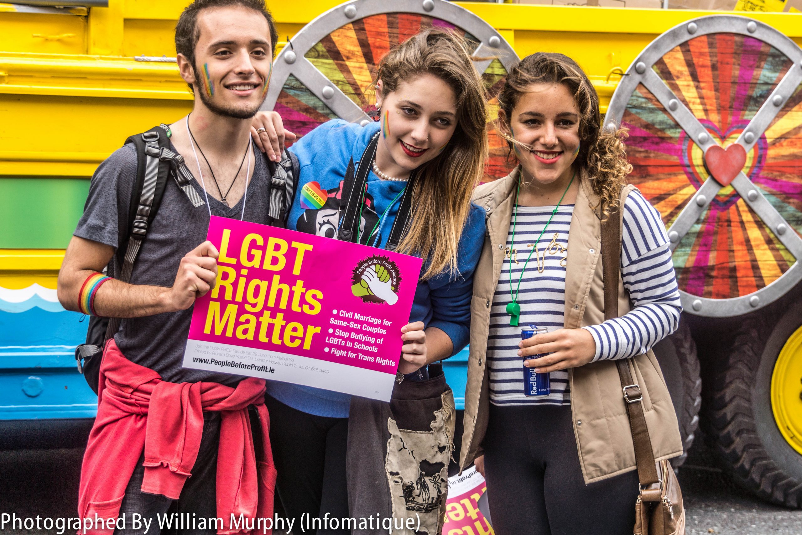 “Dublin_LGBTQ_Pride_Festival_2013_-_LGBT_Rights_Matter_(9183564890).jpg” by infomatique is licensed under CC BY-SA 2.0 Photo showing three people at a LGBT rally