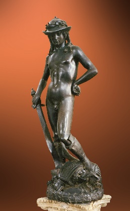 A bronze statue holding a knife