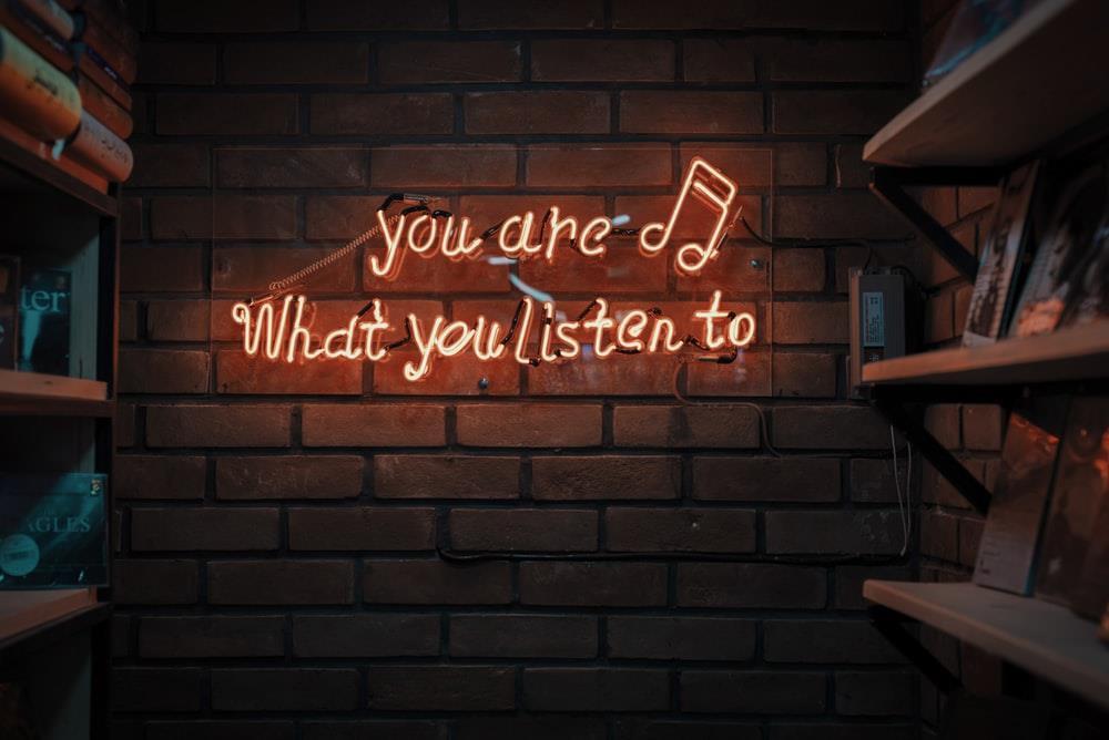 Sign saying, "You are music, what you listen to"