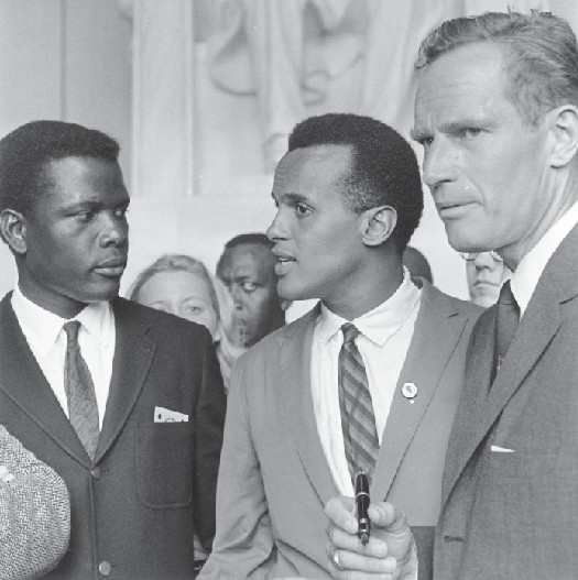 Three civil rights activists, from left to right, Sidney Poitier, Harry Belafonte, and Charlton Heston.