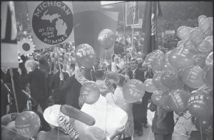 Republican national convention in 1964. People hold signs and balloons in support of George Romney.