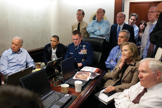 Barack Obama, Joe Biden, Hillary Clinton, Robert Gates, and other national security advisors in the White House Situation Room.