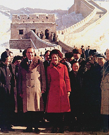 Patricia and Richard Nixon standing on the Great Wall of China.