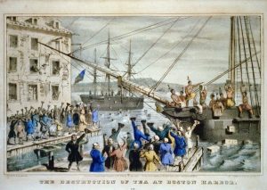 People dressed as Native Americans in boat dumping tea into the Boston Harbor while people on dock cheer them on