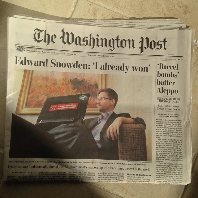Cover of The Washington Post with picture of Edward Snowden sitting in chair with laptop computer with headline that reads "Edward Snowden: 'I already won'"