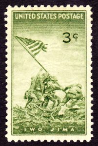 Green-hued postal stamp showing soldiers attempting to raise the American flag at the Battle of Iwo Jima