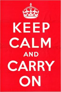Original 1939 poster with red background and white text that reads "Keep Calm and Carry On"