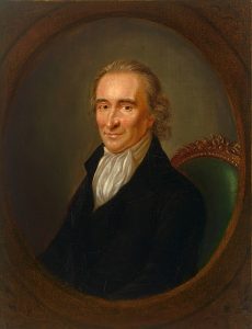 Thomas Paine seated in a chair