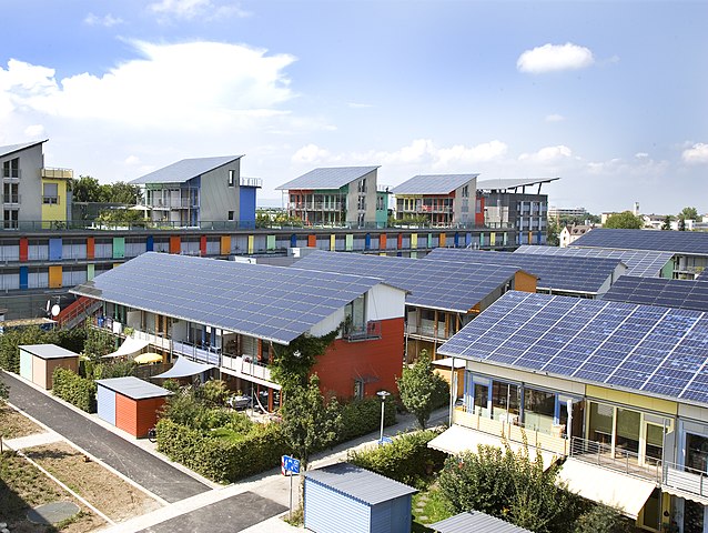Houses with solar panels on roof comprising The Solar Settlement, a sustainable housing community in Germany