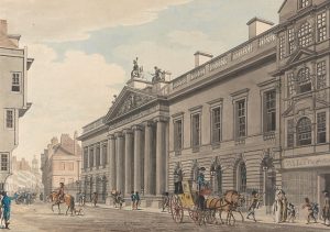 Large white stone building, the East India House, with bustling 18th century street scene in forefront