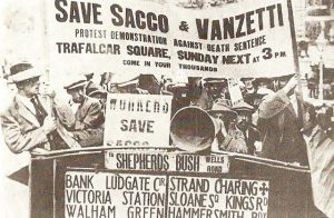 Men protesting and holding up signs to save Sacco & Vanzetti