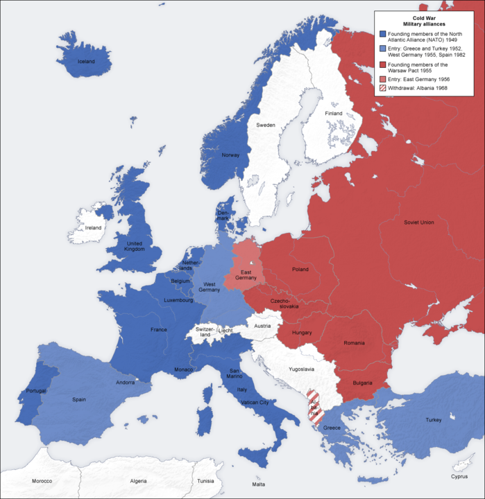 Map showing Cold War military alliances with NATO countries represented in various shades of blue, and Members of the Warsaw Pact in red