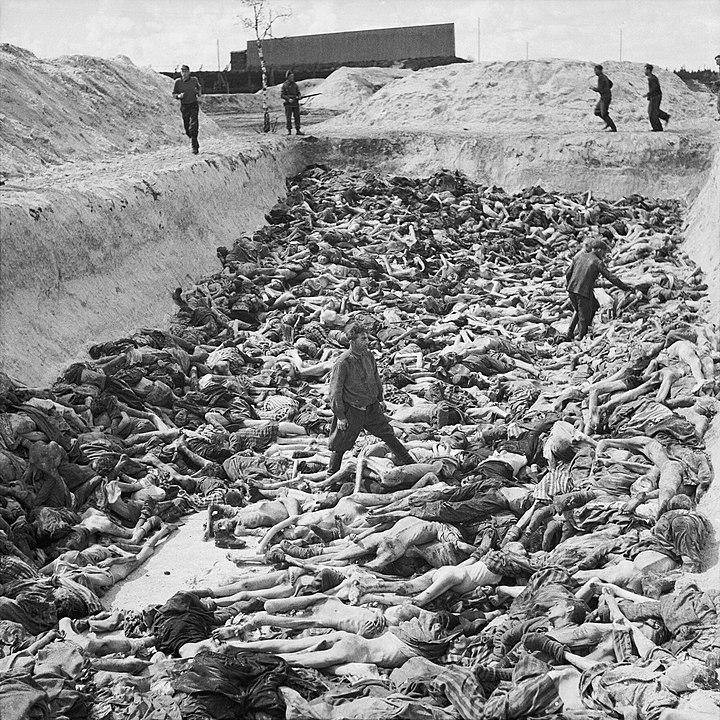 A large mass grave filled with naked, starved Jewish prisoners at Bergen-Belsen after the camp's liberation