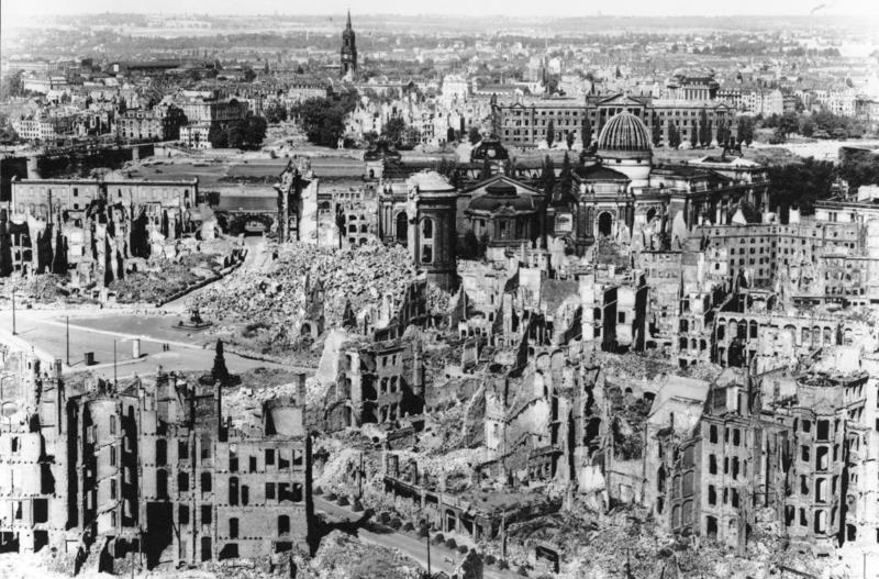 Destroyed buildings in Dresden after the bombing raid with church spire in background