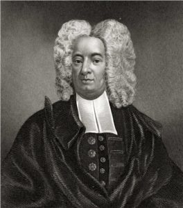 Seated man with white wig, long white collar, and dark robe