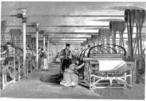 Woman in white dress kneeling at textile mill while man stands over her in a room full of similar machinery