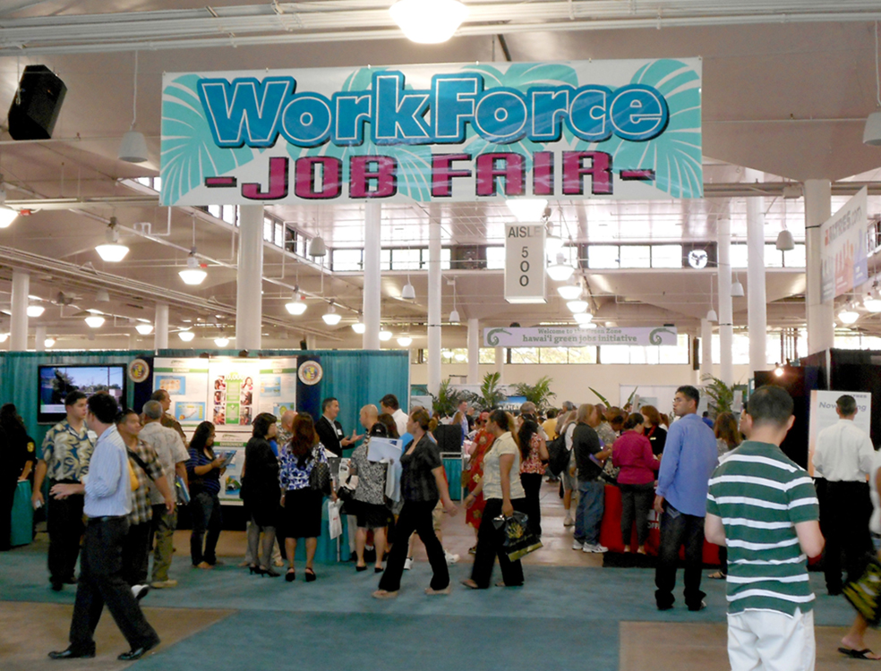 Photo of people walking around a workforce job fair.