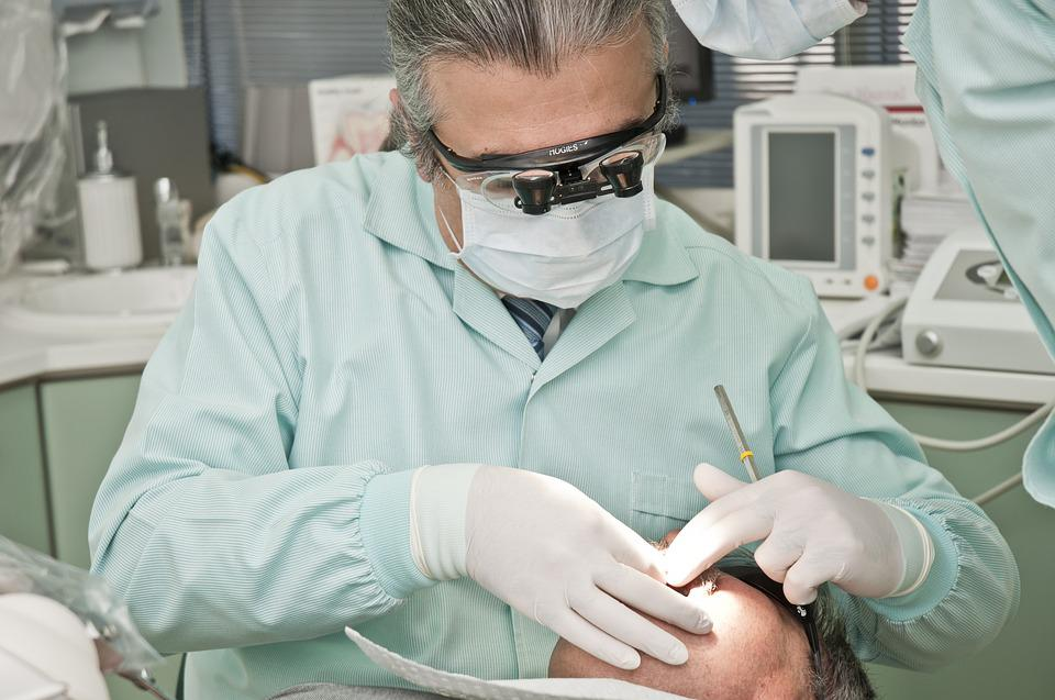 Dentist performing dental work