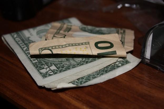 A bunch of folded dollar bills