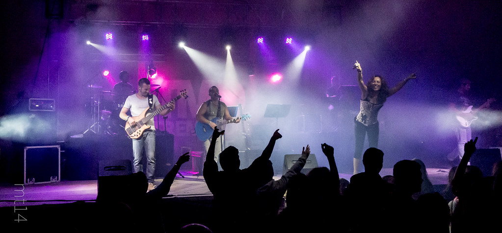 Live concert stage with musicians playing