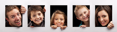 Family using photo prop frame