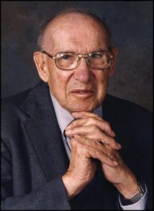 A photograph shows Peter Drucker.