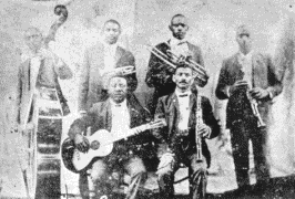 Buddy Bolden’s band, Bolden is in the second row. He is the second from left