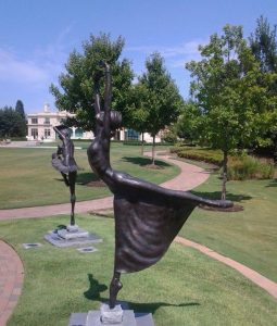 A photogrpah of bronze statues memorializing the Five Moons.