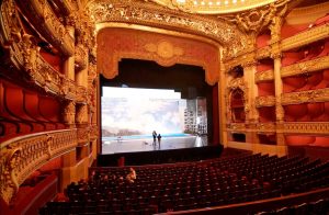 A photograph of the stage at the Garnier Opra House.