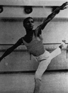 A black and white photograph of Talley Beatty dancing.